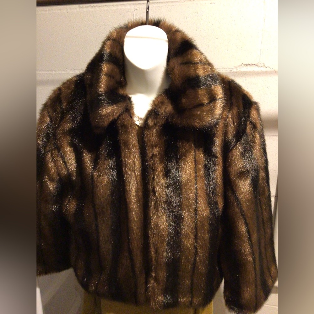 Faux fur jacket. Very cute! 🥰